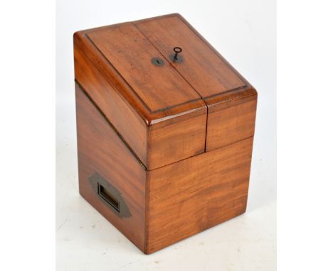 An early Victorian mahogany four section decanter box, with twin hinged sloping lids enclosing sections to hold four decanter