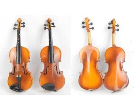 A modern three quarter size violin, cased with bow and a further cased three quarter size violin (2).