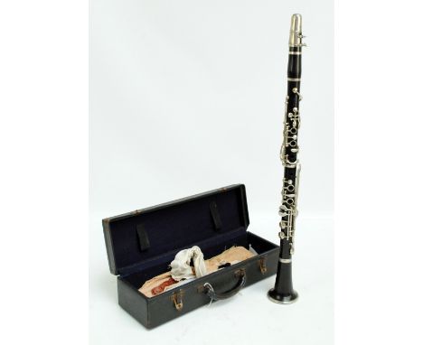 A hard cased rosewood clarinet inscribed 'Cabart, A Paris'.