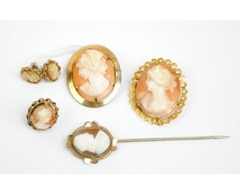 A small collection of cameo jewellery comprising a 9ct yellow gold framed cameo brooch, a single 9ct yellow gold framed earri