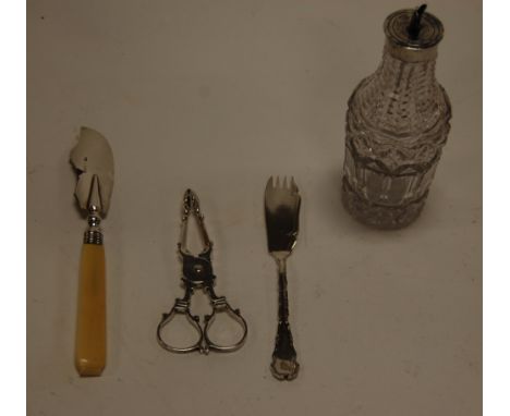 A pair of early 20th century silver sugar nips; together with a silver topped Angostura Bitters decanter; a silver plated but