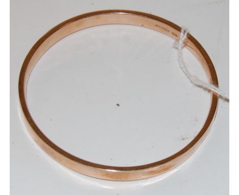 A 9ct gold bangle, 8g