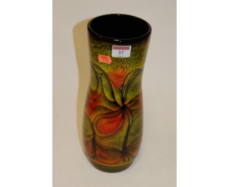 An early 20th century Poole pottery vase of cylindrical form brightly decorated with various flowers impressed Poole England 