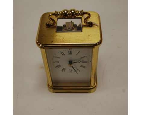 A Rapport of London lacquered brass cased carriage clock
