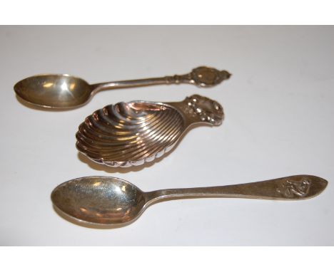 A silver and embossed caddy spoon having shell bowl together with a silver souvenir spoon and one other silver teaspoon (3)