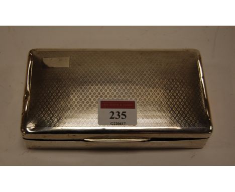 A George V silver table cigarette box of rectangular form having engine turned decoration, maker EJ Trevitt & Sons, Chester, 