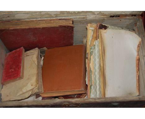 A leather clad wooden trunk and contents to include; various scrap books, postcards and greeting cards etc 