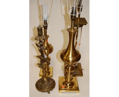 A large modern table lamp base, having a swirled glass centre section with brass fittings, h.60cm (excluding fittings); toget