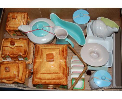 A box of miscellaneous china to include Poole pottery conch shell vase, cottage ware biscuit barrel and  cover etc   Conditio