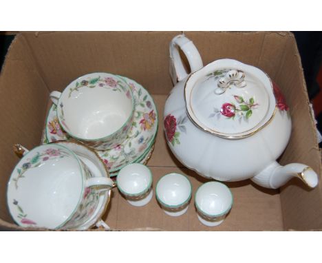 A Royal Albert Royal Canadian rose pattern teapot and cover together with Mintons Haddon Hall teacups and saucers etc