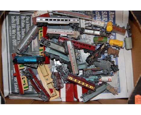 A box of various treble 000 gauge Lone Star trains, carriages, rolling stock and accessories