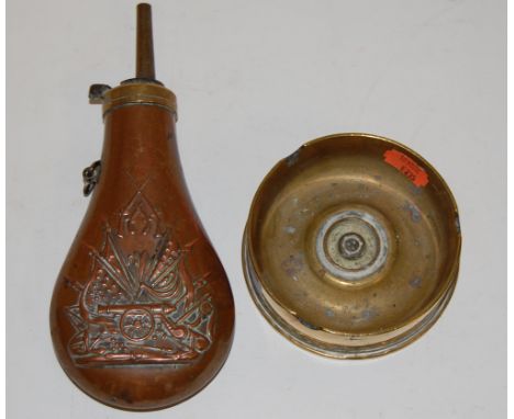 A WWII brass shell case ashtray; together with a copper powder flask (2) 