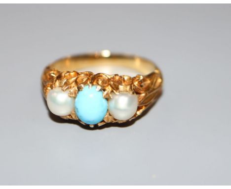 A Victorian style yellow metal turquoise and cultured pearl three stone ring, size H, gross 4.7 grams.CONDITION: Turquoise ha