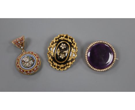 A Victorian yellow metal, black enamel and seed pearl mourning brooch, 44mm, a similar micro mosaic pendant and seed pearl se