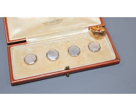 An early 20th century 18ct gold signet ring (worn and shank has interior inscription), size G, weight 7.8 grams and an 18ct, 