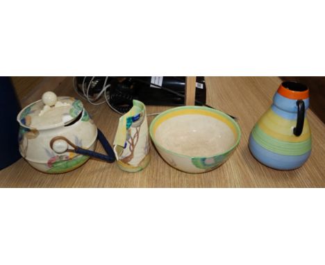 Three Clarice Cliff pots and another vase (a.f.)CONDITION: The biscuit barrel and vase are both heavily damaged and in need o