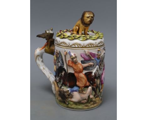 A Doccia Capo di Monte-style lidded tankard and cover, height 20cmCONDITION: Lion has been broken off and re-glued badly and 