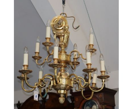 A gilt brass/ormolu baroque style twelve-light chandelier, diameter 73cm