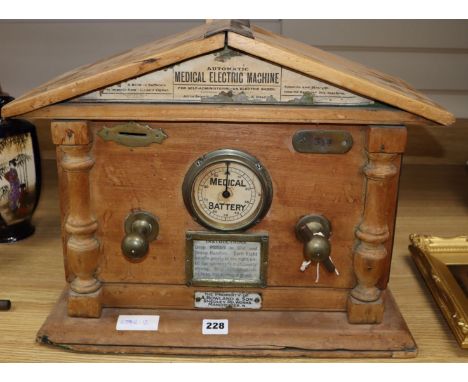 An 'Automatic Medical Electric Machine' in architectural beech case