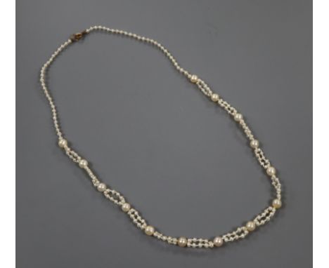 A single and part double strand cultured and seed pearl necklace, 47cm.