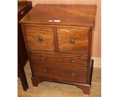 A Regency style mahogany commode, W.63cm D.43cm H.80cmCONDITION: The top is faded, the interior is now vacant, has been re-po