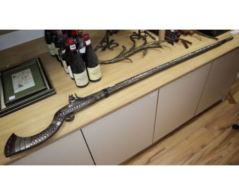 An Indo-Persian mother of pearl inlaid flintlock musket, length 166cm