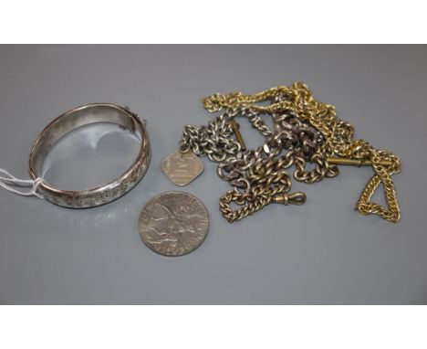 A modern silver identity bracelet, a modern silver bangle, three gilt alberts and a commemorative coin.