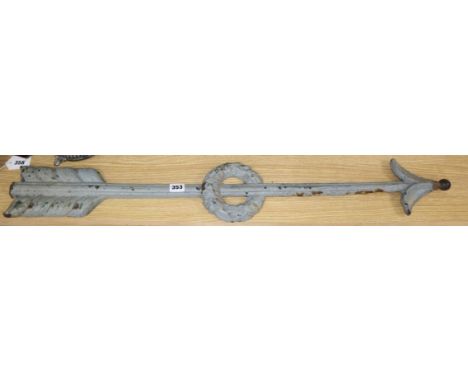 A grey painted cast iron arrow, length 94cm
