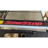 Radial arm table saw with sawstop