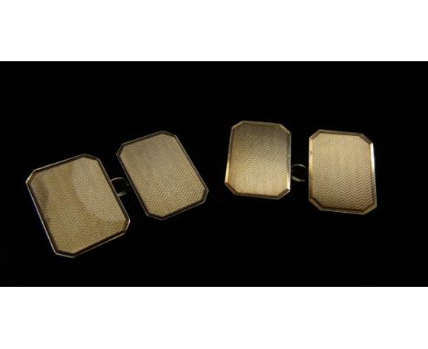 A pair of 9ct gold engine turned cufflinks, 5g 