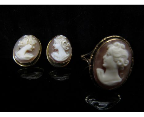 A gold cameo ring stamped 9ct. Size O, and a pair of cameo earrings, unmarked 