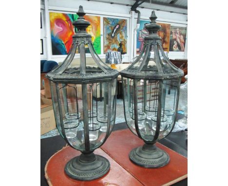 CANDLE LANTERNS, a pair, Georgian style, glass lined, with hanging glass tea light candle bowls, metal frames, 73cm H x 30cm.