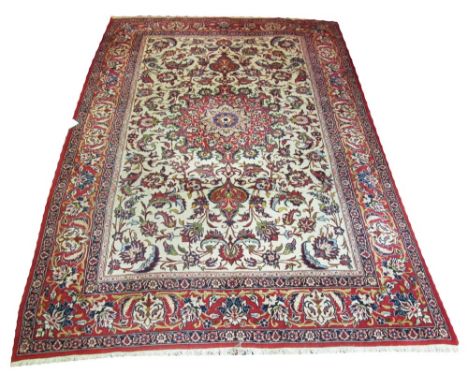 FINE VINTAGE ISFAHAN CARPET, 340cm x 233cm, central medallion on ivory field of scrolling vines and acanthus leaves. 