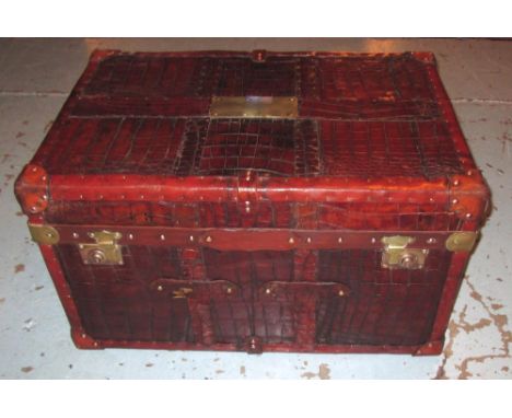 STEAMER TRUNK, brown leather and crocodile skin patterned with carrying handles, 79cm x 44cm H x 52cm.