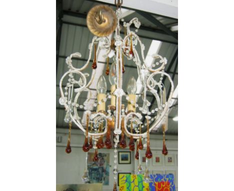 CHANDELIERS, a pair, each with five lighting arms and amber drop decoration, approx 45cm H x 45cm diam. (2)