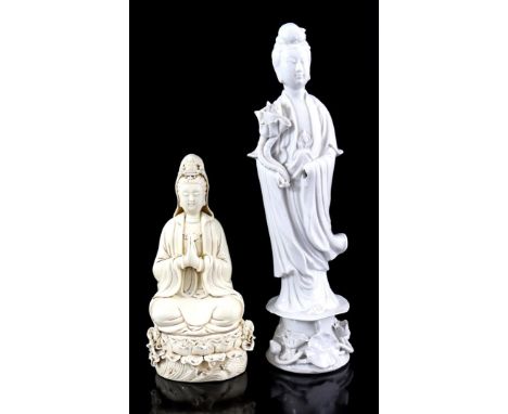 2 porcelain Guanyin figurines, first half 20th century, 26 and 41 cm high (1 hand missing)