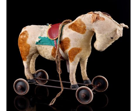 Steiff textile horse filled with syrup metal frame with wheels, 54 cm long (damaged)