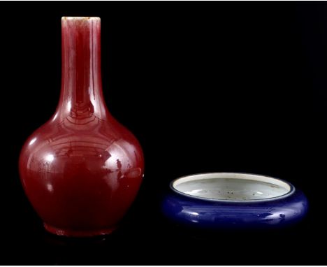 China Sang de Boeuf pipe vase ca 1900, 18 cm high and porcelain dish with blue glaze, China 20th century, 13 cm diameter