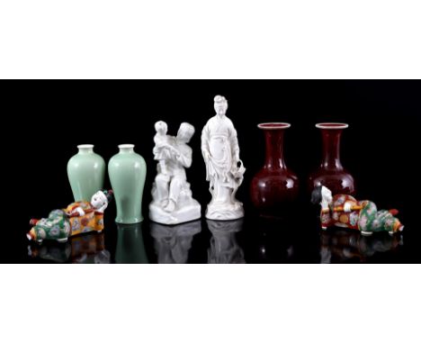 White porcelain statue of woman with basket, 26 cm high, white porcelain statue of woman with child, 20 cm high, 2 red porcel