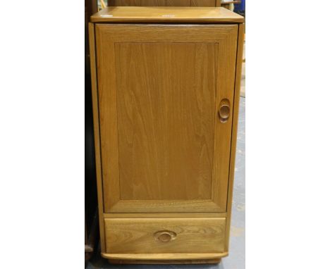 Ercol Blonde elm media cabinet, having a single door, shelved interior, hinged lid and single drawer, 50 x 48 x 99 cm H. Not 