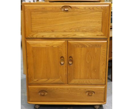 Ercol Golden Dawn elm bureau, with fall-front, fitted interior and cupboard base, 82 x 45 x 110 cm H. Not available for in-ho
