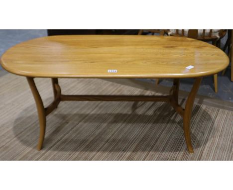 A modern Ercol blonde elm oval centre table, 115 x 59 x 48 cm H. Not available for in-house P&amp;P 