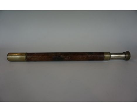 A World War I period two draw telescope by T Cooke & sons Limited London and York, with broad arrow mark, serial number 33392