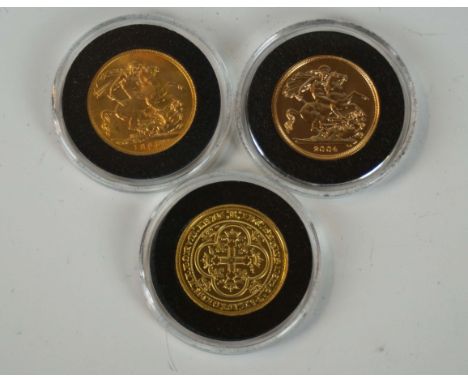 A George V gold sovereign, London Mint, dated 1925, Queen Elizabeth II gold sovereign, London Mint, dated 2004, a modern gold