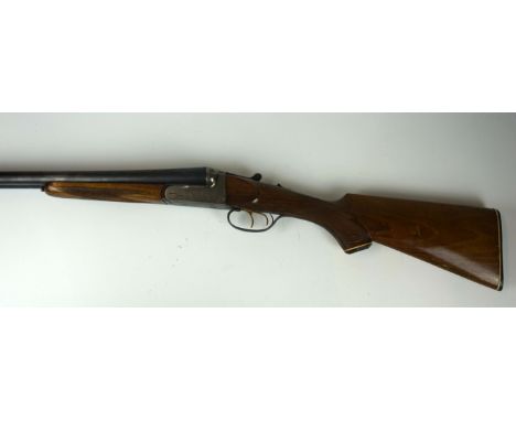 * A twelve bore side by side non-ejector box lock shotgun, by Davidson Firearms Co Greenboro N C, length of barrel 66cm, seri