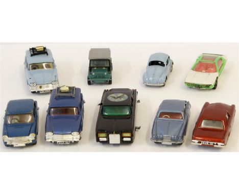 Nine unboxed dye cast vehicles comprising four Spot-on triang vehicles, metallic red Mercedes Benz 230 SL, turquoise green Au