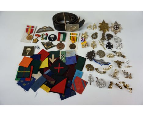 A United States of America badge for Vietnam, National Defence medal, further medal bars, arm patches to include Parachute Re