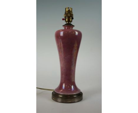 A Ruskin ceramic vase of inverted baluster form decorated in high fired pink lustre, converted to a table lamp, height exclud