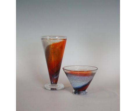 Two pieces of Kosta Boda glassware of tapering form, each decorated with orange, grey and white spiralling colourways, design