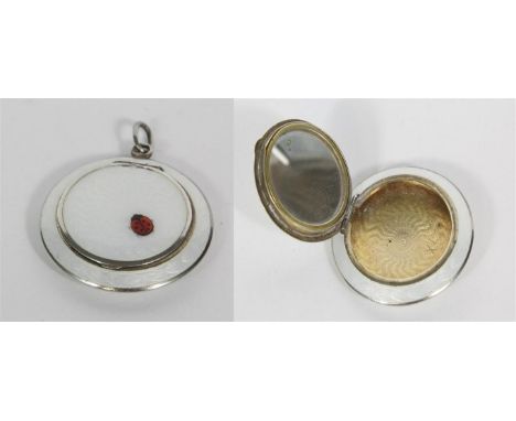 An Art Deco circa 1920/30's Russian silver gilt and guilloche enamel miniature compact, of circular form, decorated with whit